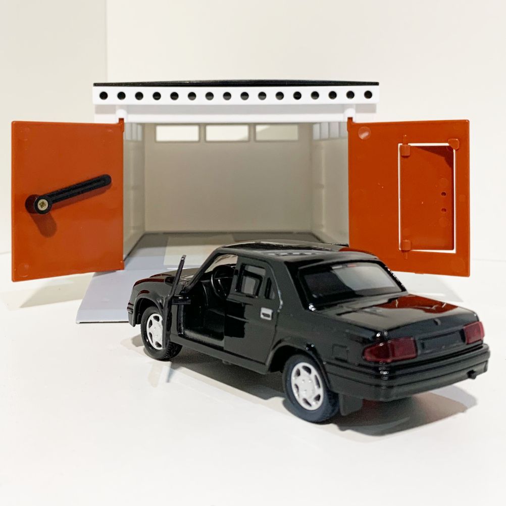 Гараж с распашными воротами и металлическая инерционная машинка Волга 3110 с 2-мя открывающимися дверями 12 см - черная