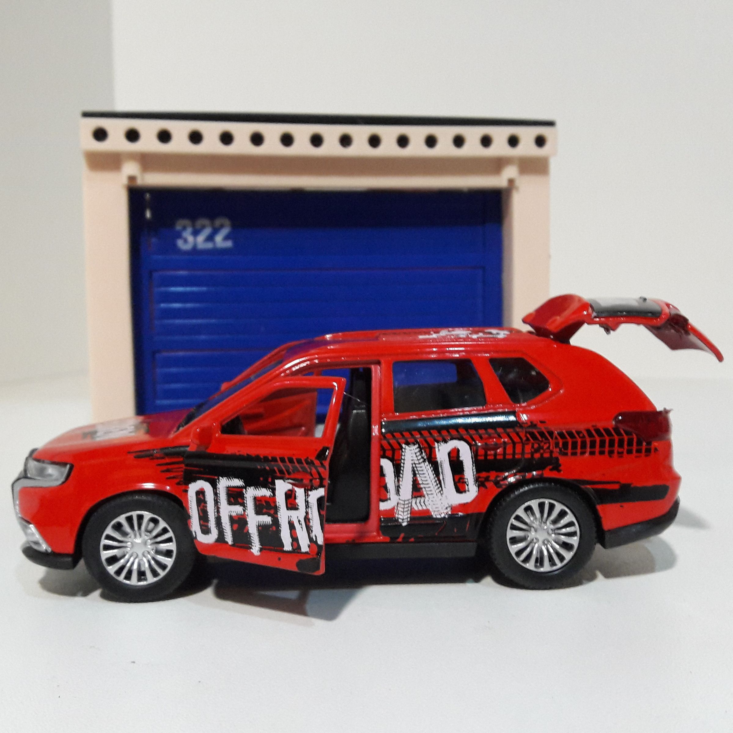 Игрушечный набор гараж с машинкой Renault Duster