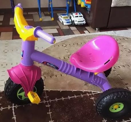 Трехколесный велосипед Малыш Ветерок фиолетовый Трехколесный велосипед Малыш Ветерок фиолетовый